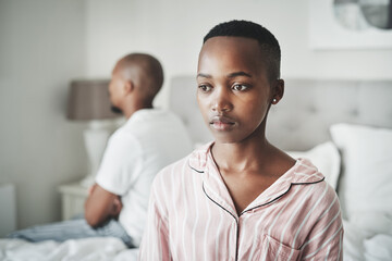 Stress, depression and insomnia, black couple on bed in home angry after argument or fight. Mental health, relationship and divorce problem, woman and man frustrated and depressed in bedroom thinking
