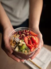 Wild acai blended with fresh strawberry and banana, topped with fresh kiwi, pomegranate, strawberry, dragonfruit, almond flakes, granola, and layered with chia pudding.