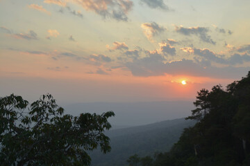 Fototapeta na wymiar View sunset time from Jam Sin cliff of Phu kradueng national park, Thailand.