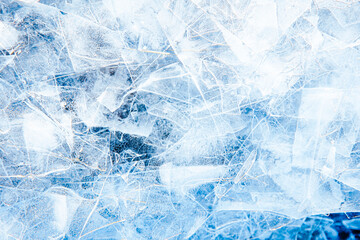 Abstract winter blue background. Fragmented ice crystals