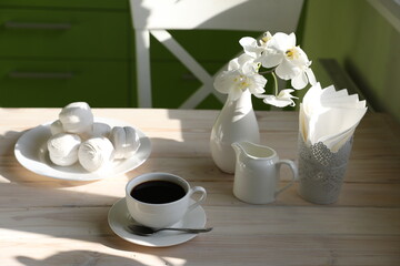 Fototapeta na wymiar breakfast with black coffee, milk and marshmallow on white background