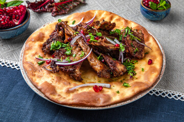 Food Table Celebration Delicious Party Meal Concept. A lot of food on the table: khachapuri, manti, lamb, beef, basturma, satsivi, pkhali, dolm.   Foodset from Georgian dishes. Caucasian food