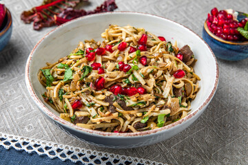 Homemade noodles with giblets. Food Table Celebration Delicious Party Meal Concept. A lot of food on the table: meat, chicken, lamb, beef.  Foodset from Georgian dishes. Caucasian food