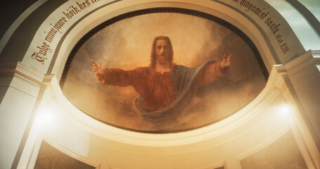 Mural Portrait of Lord Jesus Christ with Open Arms. A Painting on a Church Ceiling Depicting the...
