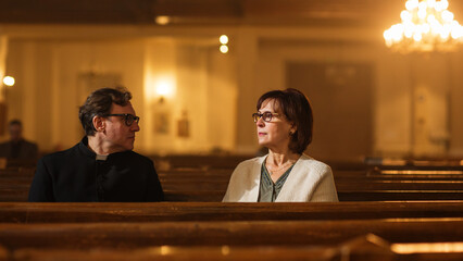 Talk in Church: The Pastor's Gentle Voice Brings Comfort and Solace To Senior Parishioner. With...