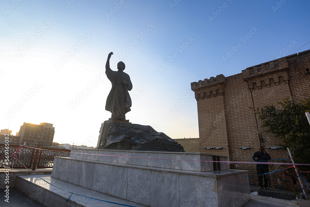 Wall mural statue of poet Almutanabi in Baghdad Iraq