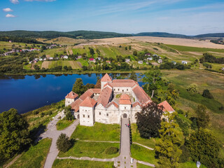 Obraz na płótnie Canvas Aerial view by drone. Summer. Svirzh Castle Ukraine Castles. Lakes. 