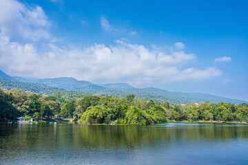 Fototapeta na wymiar a public place leisure travel landscape lake views at Ang Kaew Chiang Mai University and Doi Suthep nature forest Mountain views spring cloudy sky background with white cloud.