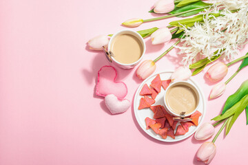 Valentine's Day romantic concept. Morning coffee, a bouquet of tulips, symbolic decor