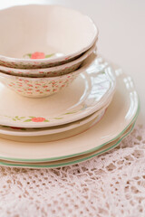 Closeup of porcelain plates and bowls