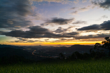 Beautiful skyline landscape sunset sky with mountains and sea.  Cityscape of Ranong Province, Thailand.