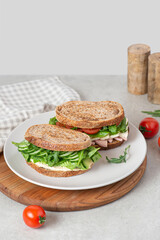 Sandwiches with different fillings in a plate on the table