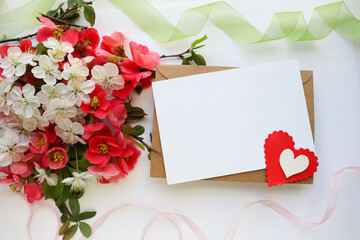 greeting card happy valentine's day. spring flowers, red heart and gift box