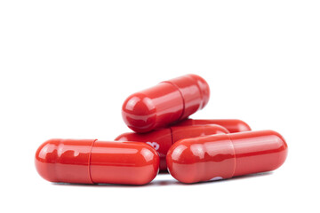 Large pill shot in a studio environment, isolated on white.