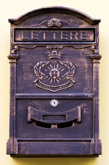 Antique brown letter box with clipping paths on a wall