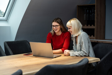 Two Young businesswoman discuss with new start up project Idea presentation, analyze planning and...