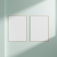 Minimal empty frame picture mockup hanging on white wall background with window light and shadow