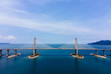 Full aerial view of the Penang bridge in day time.