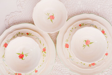 Closeup of porcelain plates and bowls