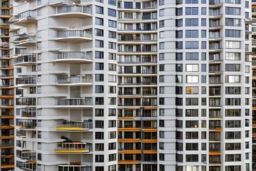 Wall of an apartment block with balconies, mady by Generative AI