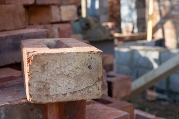 Building site: bricks and mortar for an extension, part of a renovation of an Edwardian suburban house in north London, UK