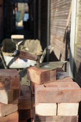Building site: bricks and mortar for an extension, part of a renovation of an Edwardian suburban house in north London, UK