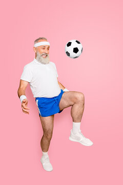 cute elderly doctor holding a soccer ball, promoting sports