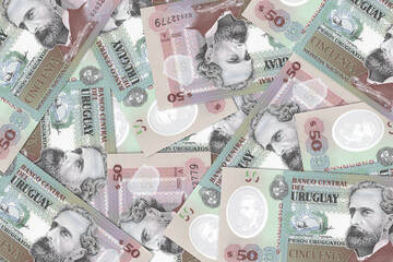 The Uruguayan currency - the Uruguayan peso. Macro view of Uruguay paper money. Close-up Uruguay money