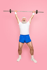 Full length of confident cool funny insane emotional active grandpa with win victory grimace, exercising training, holding equipment, lifts it up, wears sexy shorts, sneakers, yell shout