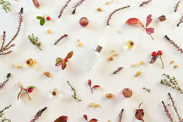 Essential oil bottles with wintergreen, frankincense and thyme, top view