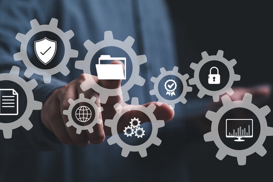 Gear icon business data analytics and robotic process automation management with a consultant touching connected gear cogs with KPI financial charts and graph, marketing dashboard.