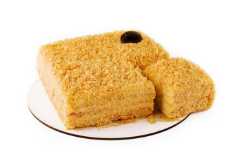 Napoleon Cake on a white plate isolated