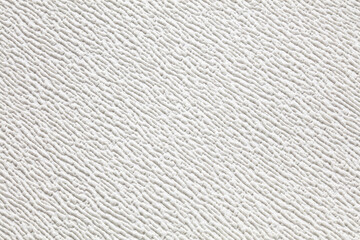 The texture of white paper wallpaper with small volumetric strokes.