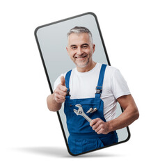 Cheerful repairman and plumber giving a thumbs up in a smartphone videocall and smiling, online ...