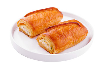 Two puff pies with cottage cheese in plate