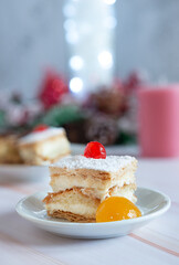 millefeuille cake with candied cherry