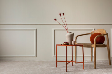 Minimalist composition of living room interior with copy space, wooden chair, round coffee table,...