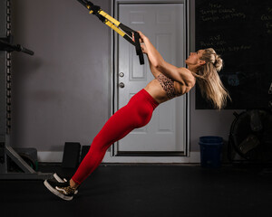 Woman doing a modified pullup.