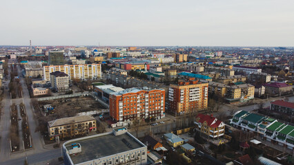 Morning city under the open sunny sky