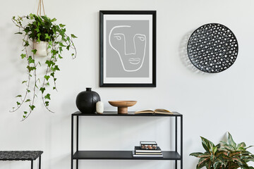 Minimalistic stylish composition of creative room interior design with mock up poster frame, metal shelf, plants and personal accesories. Black and white concept. Template.