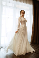 Fototapeta premium bride in a white dress at the training camp