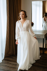 Fototapeta premium bride in a white dress at the training camp