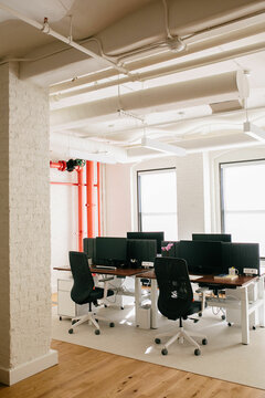 Shared Office Space Set Up In Industrial New York Loft