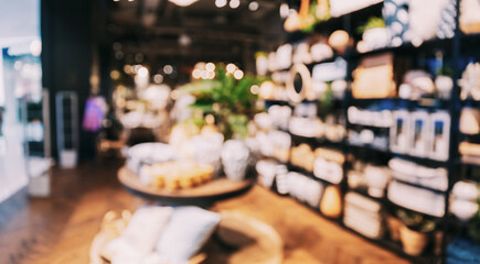 Obraz premium View of assortment of decor for interior shop in store of shopping center. Home accessories and household products in store of shopping centre. Abstract blur blurred boke bokeh background.