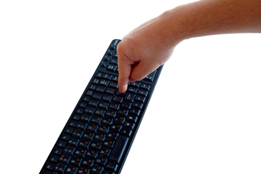 Human hand and black keyboard. Pressing enter key on keyboard, isolate