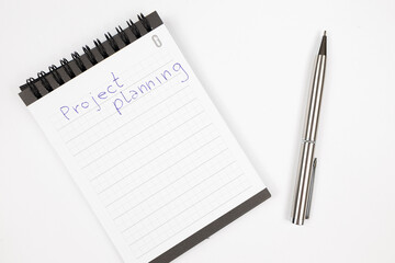 Project plan notes with metal pen - Productivity plan - Business and self improvement