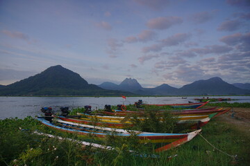 Fishing boats anchored at the Jatiluhur reservoir. Beautiful view of Jatiluhur reservoir with...
