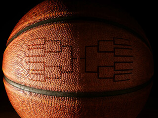 Fototapeta Closeup of a basketball with a tournament bracket obraz