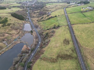 Aerial view of countryside with lakes and winding roads. Taken in Bury Lancashire England. 