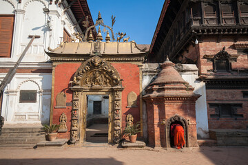 Fototapeta premium The golden gate of Bhaktapur in Bhaktapur Durbar Square, Nepal. It is the entrance to the main courtyard of the palace of fifty-five windows